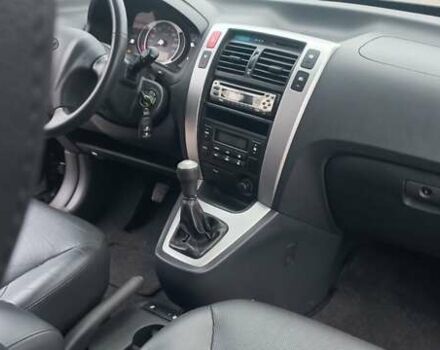 Черный Хендай Туксон, объемом двигателя 1.98 л и пробегом 155 тыс. км за 7999 $, фото 40 на Automoto.ua