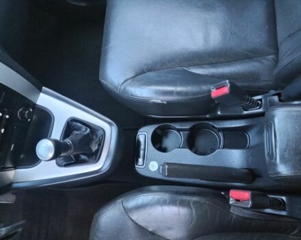 Черный Хендай Туксон, объемом двигателя 2 л и пробегом 192 тыс. км за 7950 $, фото 17 на Automoto.ua