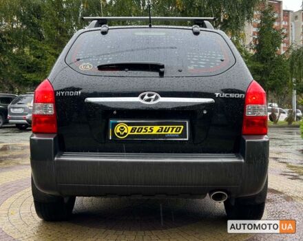 Черный Хендай Туксон, объемом двигателя 2 л и пробегом 201 тыс. км за 8600 $, фото 5 на Automoto.ua