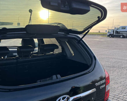 Черный Хендай Туксон, объемом двигателя 1.98 л и пробегом 243 тыс. км за 8500 $, фото 22 на Automoto.ua