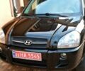 Черный Хендай Туксон, объемом двигателя 2 л и пробегом 277 тыс. км за 7750 $, фото 1 на Automoto.ua
