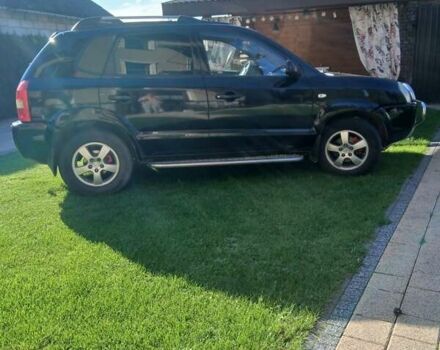 Черный Хендай Туксон, объемом двигателя 2 л и пробегом 15 тыс. км за 6200 $, фото 8 на Automoto.ua