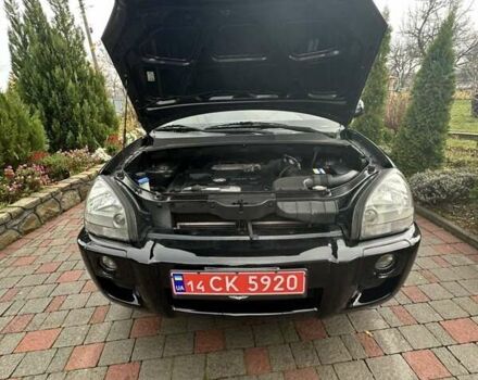 Черный Хендай Туксон, объемом двигателя 2 л и пробегом 218 тыс. км за 7600 $, фото 29 на Automoto.ua