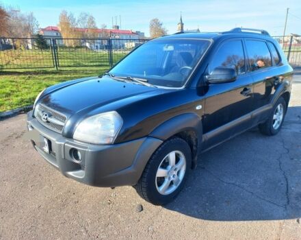 Черный Хендай Туксон, объемом двигателя 2 л и пробегом 227 тыс. км за 7300 $, фото 3 на Automoto.ua