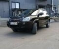 Черный Хендай Туксон, объемом двигателя 2 л и пробегом 235 тыс. км за 7550 $, фото 1 на Automoto.ua