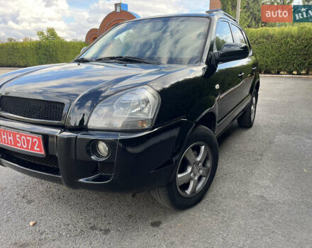 Черный Хендай Туксон, объемом двигателя 2 л и пробегом 256 тыс. км за 7800 $, фото 21 на Automoto.ua