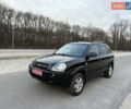 Черный Хендай Туксон, объемом двигателя 1.98 л и пробегом 159 тыс. км за 7600 $, фото 11 на Automoto.ua