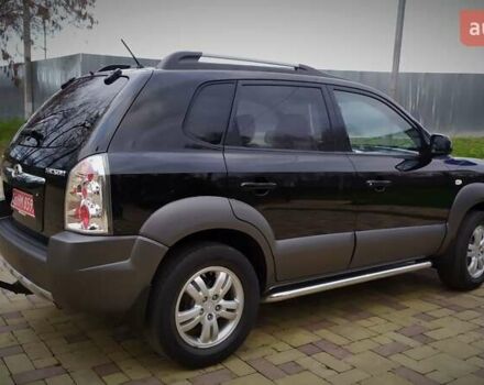 Чорний Хендай Туксон, об'ємом двигуна 2 л та пробігом 229 тис. км за 8600 $, фото 42 на Automoto.ua