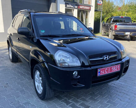 Черный Хендай Туксон, объемом двигателя 1.98 л и пробегом 197 тыс. км за 8000 $, фото 1 на Automoto.ua