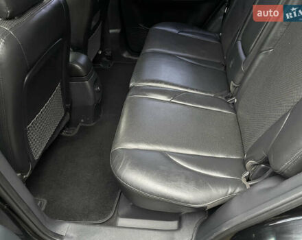 Черный Хендай Туксон, объемом двигателя 2 л и пробегом 180 тыс. км за 7700 $, фото 23 на Automoto.ua