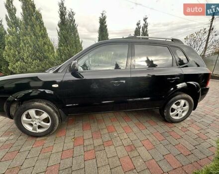 Черный Хендай Туксон, объемом двигателя 2 л и пробегом 218 тыс. км за 7600 $, фото 9 на Automoto.ua