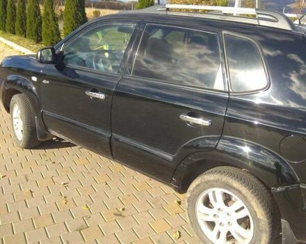 Черный Хендай Туксон, объемом двигателя 2 л и пробегом 277 тыс. км за 7900 $, фото 7 на Automoto.ua