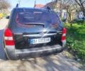 Черный Хендай Туксон, объемом двигателя 2 л и пробегом 262 тыс. км за 7800 $, фото 3 на Automoto.ua
