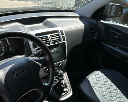 Чорний Хендай Туксон, об'ємом двигуна 1.98 л та пробігом 188 тис. км за 7000 $, фото 4 на Automoto.ua