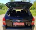 Чорний Хендай Туксон, об'ємом двигуна 2 л та пробігом 231 тис. км за 7700 $, фото 6 на Automoto.ua