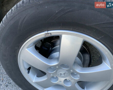 Чорний Хендай Туксон, об'ємом двигуна 2 л та пробігом 56 тис. км за 9500 $, фото 8 на Automoto.ua