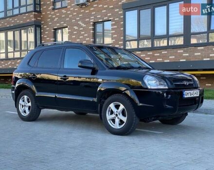 Черный Хендай Туксон, объемом двигателя 1.98 л и пробегом 286 тыс. км за 7300 $, фото 1 на Automoto.ua