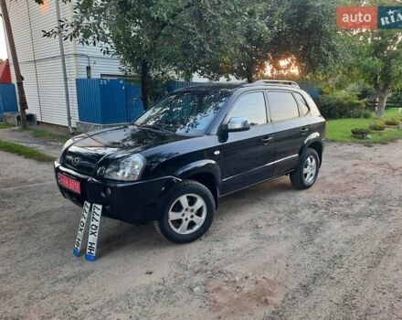 Черный Хендай Туксон, объемом двигателя 2 л и пробегом 219 тыс. км за 7990 $, фото 6 на Automoto.ua