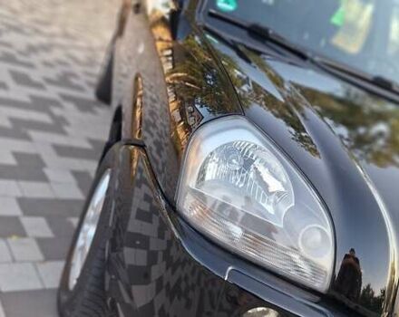 Черный Хендай Туксон, объемом двигателя 2 л и пробегом 190 тыс. км за 8150 $, фото 16 на Automoto.ua