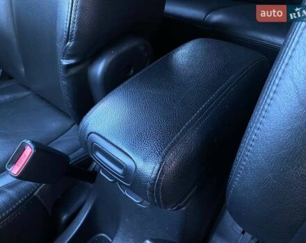 Черный Хендай Туксон, объемом двигателя 1.98 л и пробегом 286 тыс. км за 7300 $, фото 22 на Automoto.ua