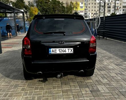 Чорний Хендай Туксон, об'ємом двигуна 2 л та пробігом 240 тис. км за 8600 $, фото 5 на Automoto.ua