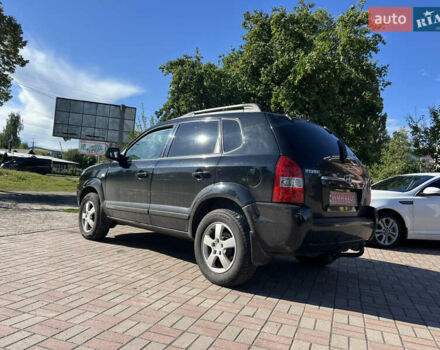 Чорний Хендай Туксон, об'ємом двигуна 2 л та пробігом 229 тис. км за 8400 $, фото 2 на Automoto.ua