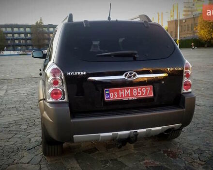 Черный Хендай Туксон, объемом двигателя 2 л и пробегом 230 тыс. км за 8600 $, фото 16 на Automoto.ua