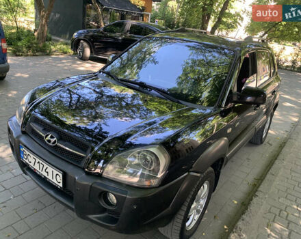 Черный Хендай Туксон, объемом двигателя 1.98 л и пробегом 232 тыс. км за 9100 $, фото 18 на Automoto.ua
