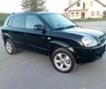Черный Хендай Туксон, объемом двигателя 2 л и пробегом 240 тыс. км за 2700 $, фото 1 на Automoto.ua