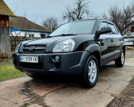 Черный Хендай Туксон, объемом двигателя 2 л и пробегом 272 тыс. км за 7500 $, фото 13 на Automoto.ua
