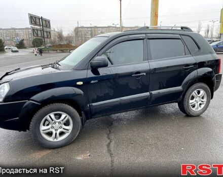 Черный Хендай Туксон, объемом двигателя 2 л и пробегом 190 тыс. км за 7800 $, фото 6 на Automoto.ua