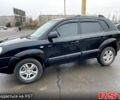 Черный Хендай Туксон, объемом двигателя 2 л и пробегом 190 тыс. км за 7800 $, фото 6 на Automoto.ua