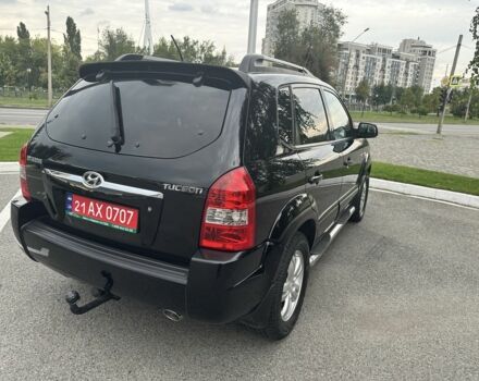 Черный Хендай Туксон, объемом двигателя 2 л и пробегом 199 тыс. км за 7820 $, фото 6 на Automoto.ua