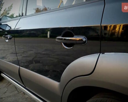 Черный Хендай Туксон, объемом двигателя 2 л и пробегом 230 тыс. км за 8600 $, фото 79 на Automoto.ua