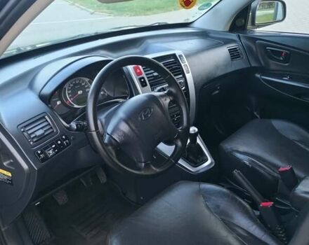 Чорний Хендай Туксон, об'ємом двигуна 1.98 л та пробігом 192 тис. км за 7950 $, фото 21 на Automoto.ua