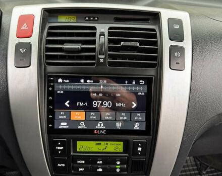 Хендай Туксон 2007 в Ужгороде на Automoto.ua Черный Хендай Туксон, объемом двигателя 1.98 л и пробегом 157 тыс. км за 7300 $, фото 33 на Automoto.ua