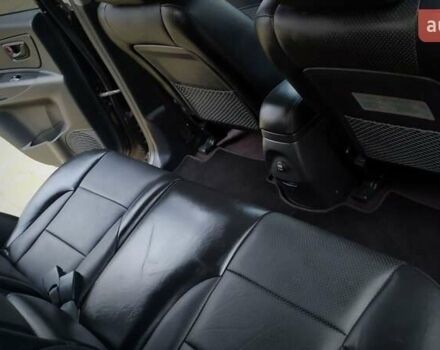 Чорний Хендай Туксон, об'ємом двигуна 2 л та пробігом 229 тис. км за 8600 $, фото 137 на Automoto.ua