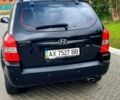 Черный Хендай Туксон, объемом двигателя 2 л и пробегом 175 тыс. км за 8900 $, фото 2 на Automoto.ua