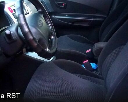 Чорний Хендай Туксон, об'ємом двигуна 2 л та пробігом 179 тис. км за 8300 $, фото 3 на Automoto.ua