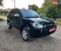 Черный Хендай Туксон, объемом двигателя 2 л и пробегом 219 тыс. км за 7990 $, фото 24 на Automoto.ua