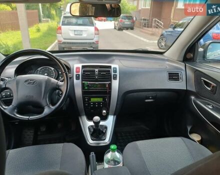 Чорний Хендай Туксон, об'ємом двигуна 1.98 л та пробігом 199 тис. км за 7400 $, фото 2 на Automoto.ua