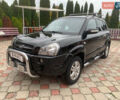 Черный Хендай Туксон, объемом двигателя 2 л и пробегом 219 тыс. км за 8600 $, фото 1 на Automoto.ua