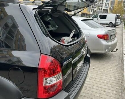 Черный Хендай Туксон, объемом двигателя 1.98 л и пробегом 147 тыс. км за 8000 $, фото 32 на Automoto.ua