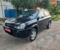 Черный Хендай Туксон, объемом двигателя 2 л и пробегом 219 тыс. км за 7990 $, фото 23 на Automoto.ua