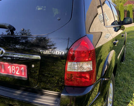 Черный Хендай Туксон, объемом двигателя 1.98 л и пробегом 197 тыс. км за 8000 $, фото 13 на Automoto.ua