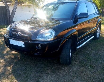 Черный Хендай Туксон, объемом двигателя 2 л и пробегом 236 тыс. км за 8300 $, фото 1 на Automoto.ua