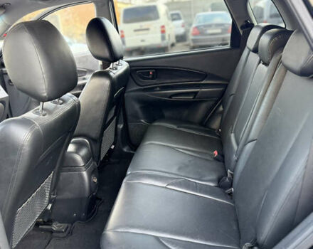 Черный Хендай Туксон, объемом двигателя 1.98 л и пробегом 230 тыс. км за 7750 $, фото 16 на Automoto.ua