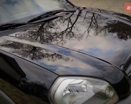 Чорний Хендай Туксон, об'ємом двигуна 2 л та пробігом 229 тис. км за 8600 $, фото 61 на Automoto.ua