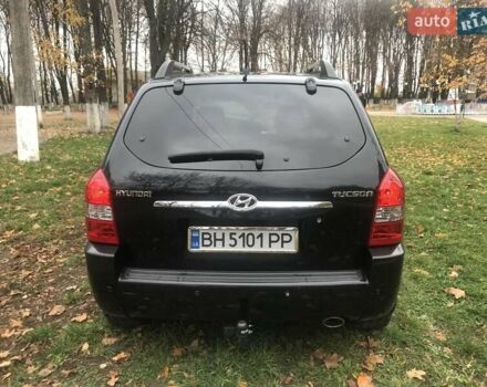 Черный Хендай Туксон, объемом двигателя 2 л и пробегом 210 тыс. км за 8999 $, фото 24 на Automoto.ua