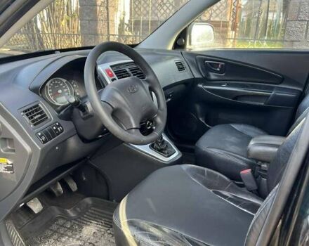 Черный Хендай Туксон, объемом двигателя 1.99 л и пробегом 302 тыс. км за 6900 $, фото 8 на Automoto.ua